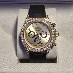 Rolex Gold and Black Chronograph with Diamond Bezel